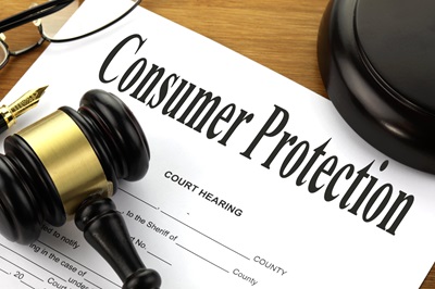 Gavel and consumer protection court paperwork Gavel and consumer protection court paperwork