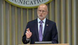 FCC Chairman Brendan Carr at podium