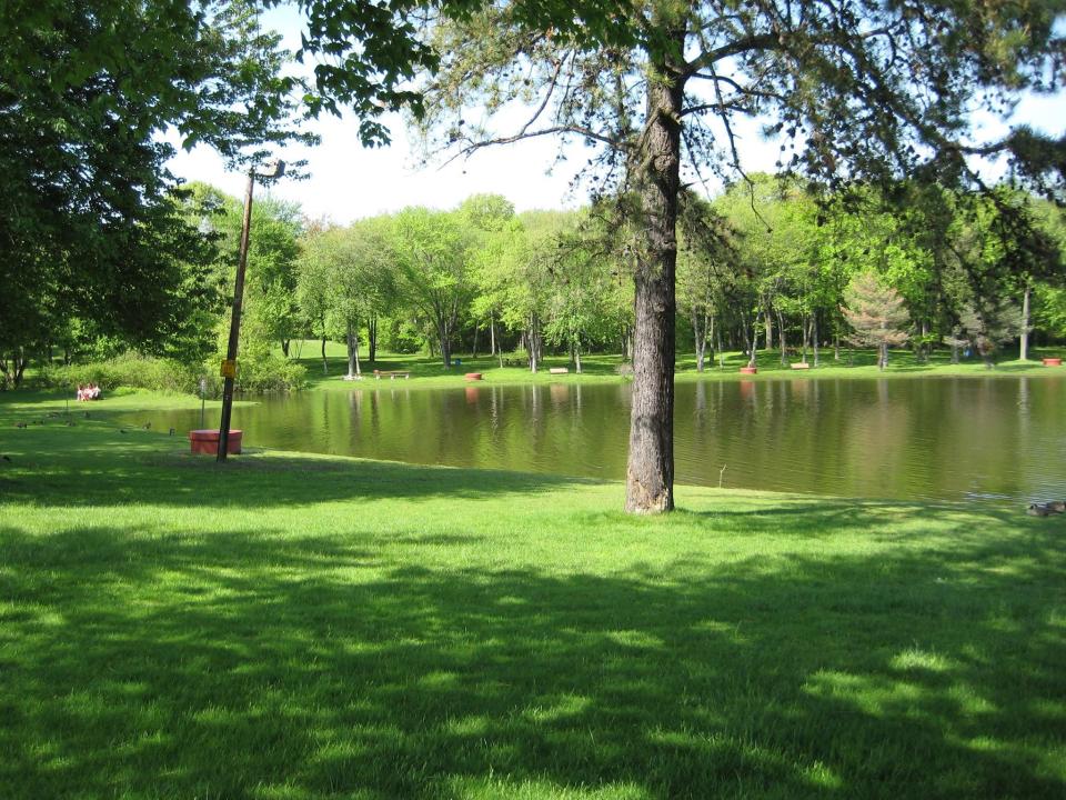 East Longmeadow park with lake in background