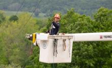 Bucket truck deploying fiber in NY