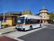 A Sonoma County transit bus makes a stop at Windsor Station on a clear sunny day in Sonoma County CA
