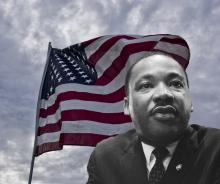A headshot of Martin Luther King Jr. in front of an American flag